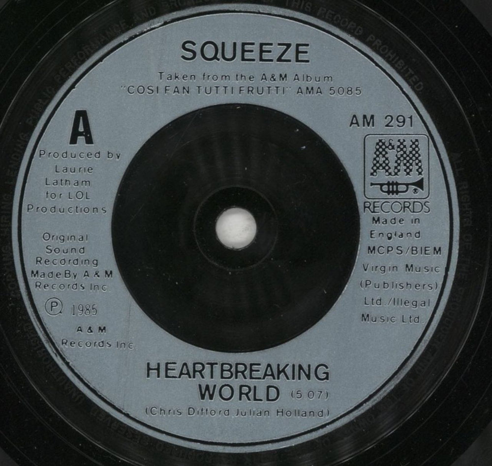 Squeeze Heartbreaking World UK 7" vinyl single (7 inch record / 45) SQU07HE102528