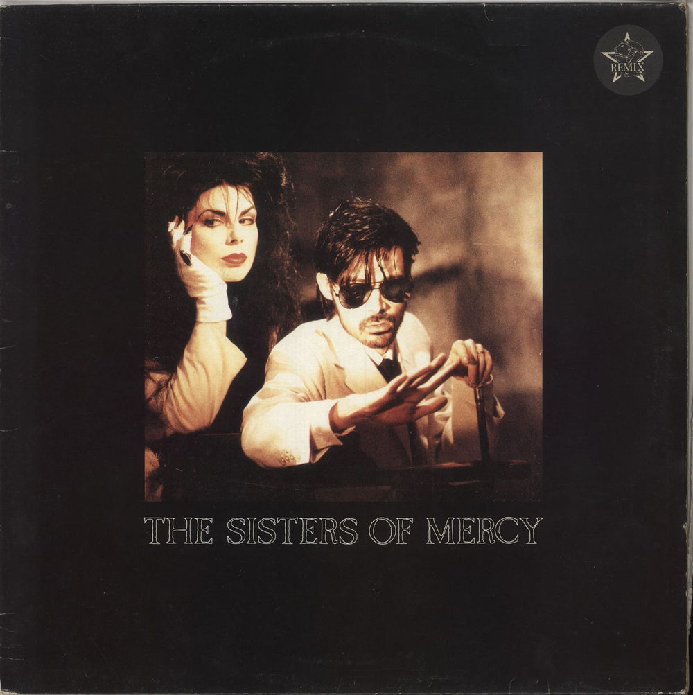 The Sisters Of Mercy Dominion [Remix] - Stickered UK 12" vinyl single (12 inch record / Maxi-single) MR43T