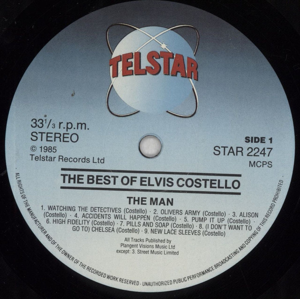 Elvis Costello The Best Of Elvis Costello - The Man - stickered shrink UK vinyl LP album (LP record) COSLPTH828686