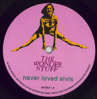 The Wonder Stuff Never Loved Elvis - VG UK vinyl LP album (LP record) WONLPNE828510